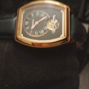 FOSSIL automatic watch. It's a beautiful navy blue & gold tone. ME3048.